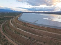 #9: View South (across a large reclamation pond, filled with mine tailings) from 120 m above the point