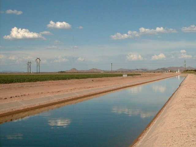 A canal, looking east from the confluence, carrying well water