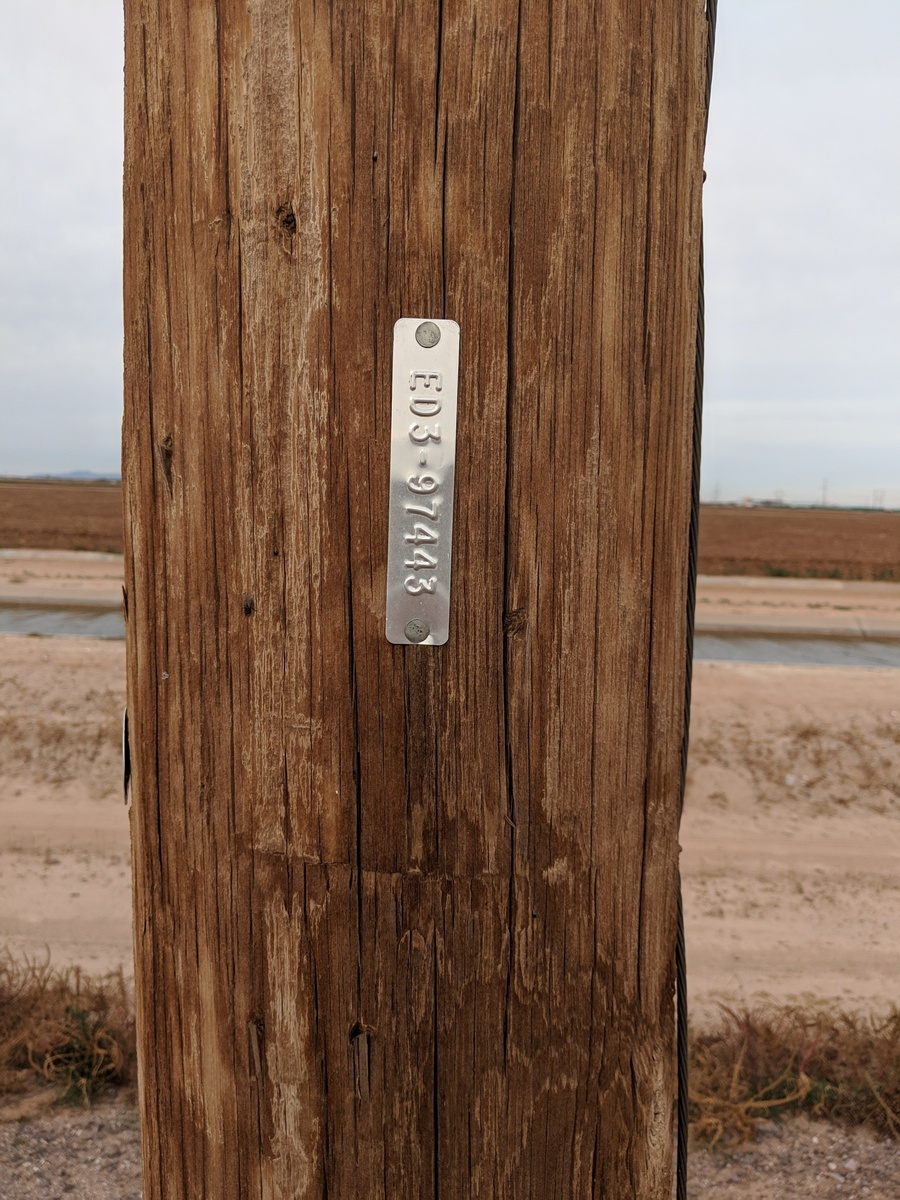 Power pole near stopping point. Confluence to north 75 m