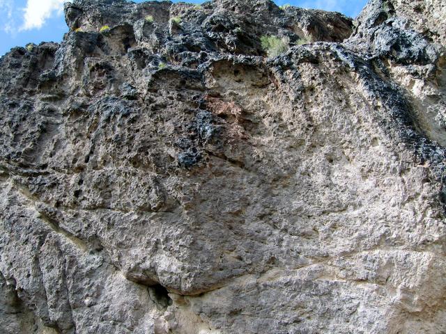 View west towards vertical face of confluence massif