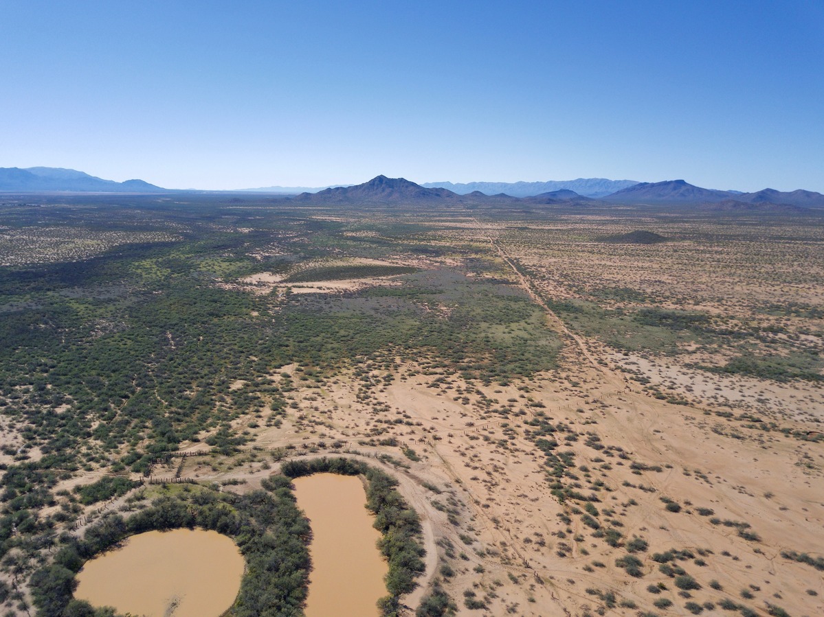 View West (of the farm’s corral and stock ponds) from 120 m above the point