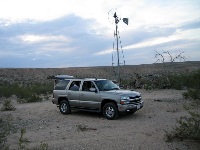 View northwest and shows our vehicle at the windmill near Grapevine Wash