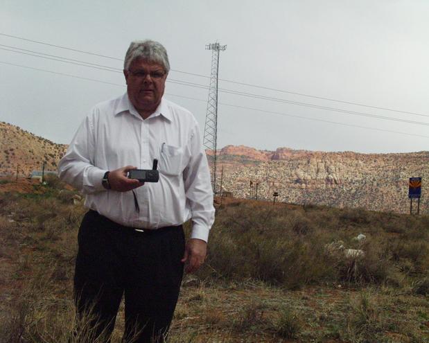 the confluence visitor. Diane stayed in the car, a white Ford Explorer just visible in photo 1