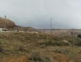 #2: looking east. the border between Utah and Arizona is the blue and yellow sign in the right-hand side of the photo