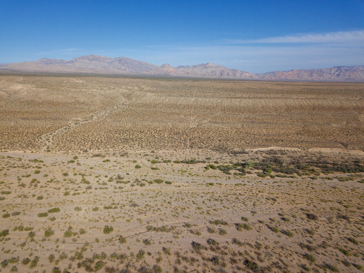 View East (along the Utah-Arizona state line), from 120m above the point