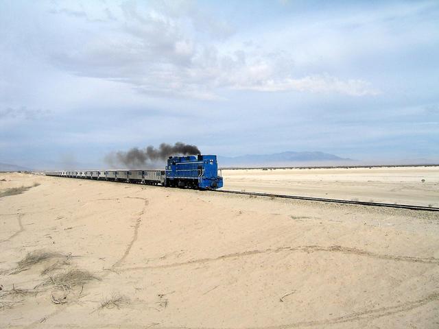 Eastbound train at base of Fish Creek Mountains