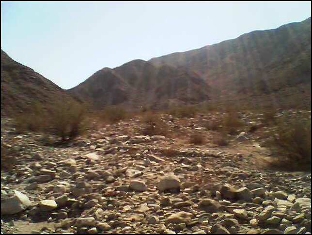 The boulder field between you and the mountains