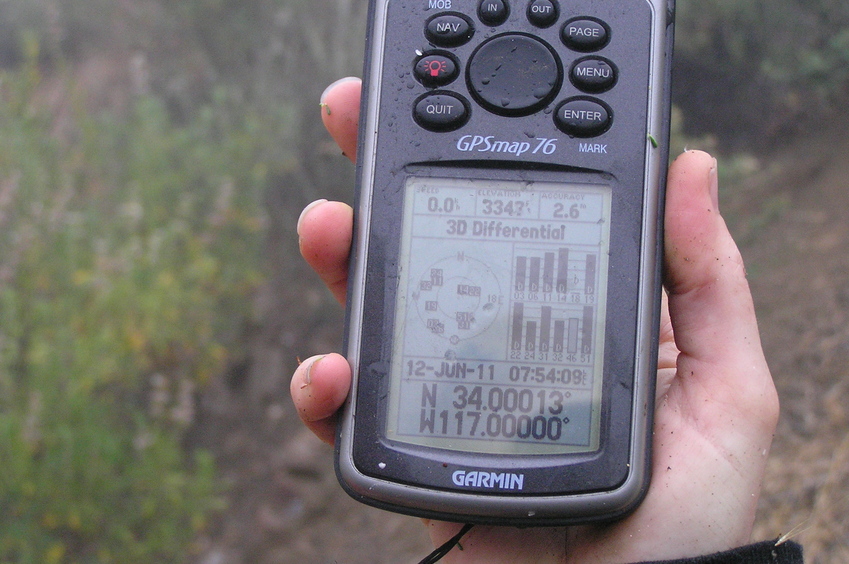 Wet GPS receiver at the confluence site.