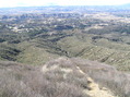 #6: From the ridgetop to the east:  Looking west, the confluence lies in the valley in the mid-center of this photograph.