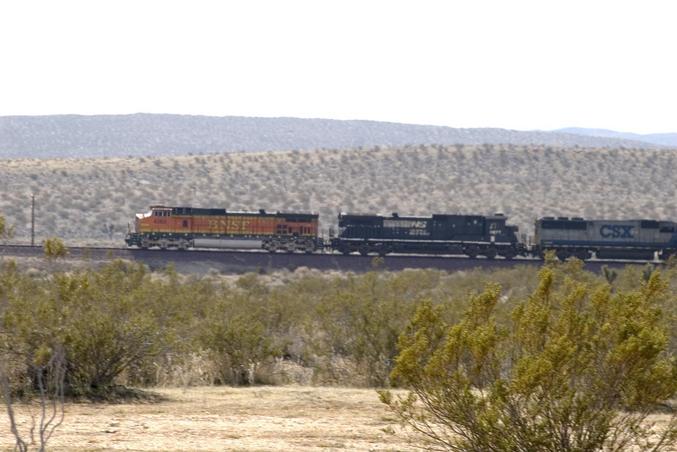 rail line to south and visible from site