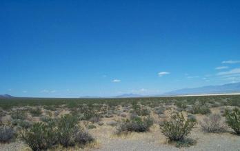 #1: Looking north, across the dry lake on the right you can partially make out the town of Pahrump