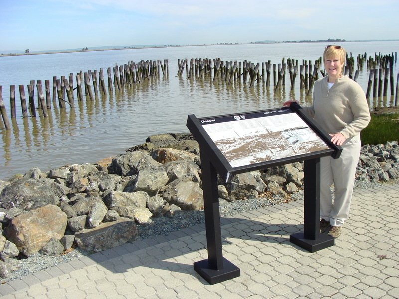 Port Chicago: Wayside exhibit at Pier A site shows destruction from 1944 explosion.