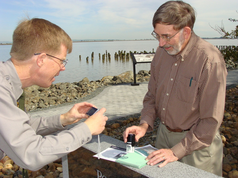 John Documenting Woody_s Visit to Park 392.JPG -- Ranger Keibel documents Woody’s visit to his 392nd U.S. national park.