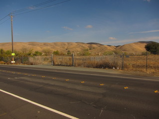 #1: View of confluence point, 55 m beyond the chain link fence