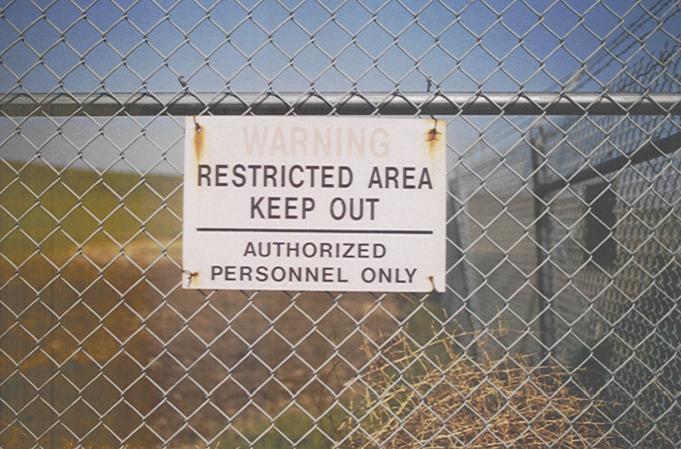 Security fence surrounding Naval facility.