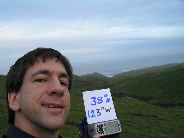 Joseph Kerski and a view to the Pacific coast to the west from the confluence.