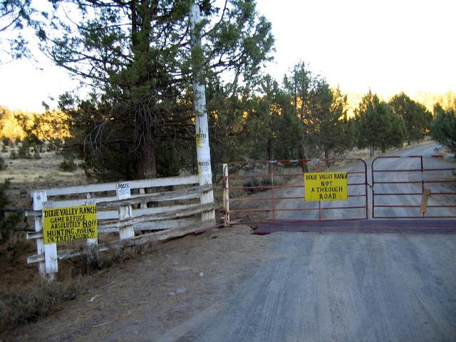Locked gate across the road southwest of confluence