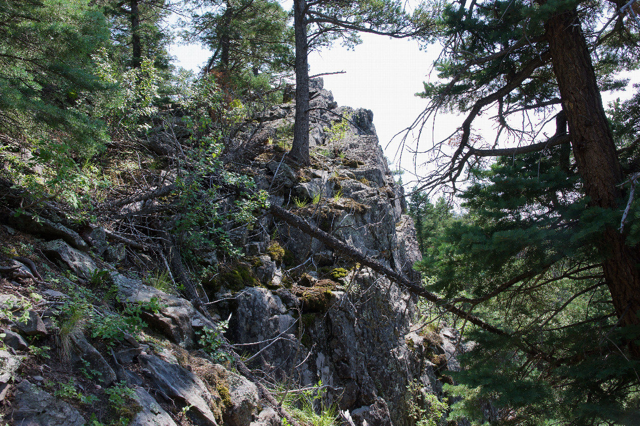 A prominent rock formation on the southern edge of the canyon, about 350 feet from the point