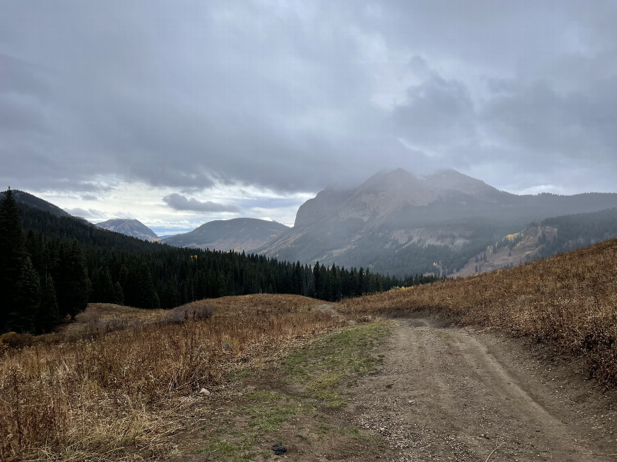 View from the road back down to where we parked and the mountains beyond