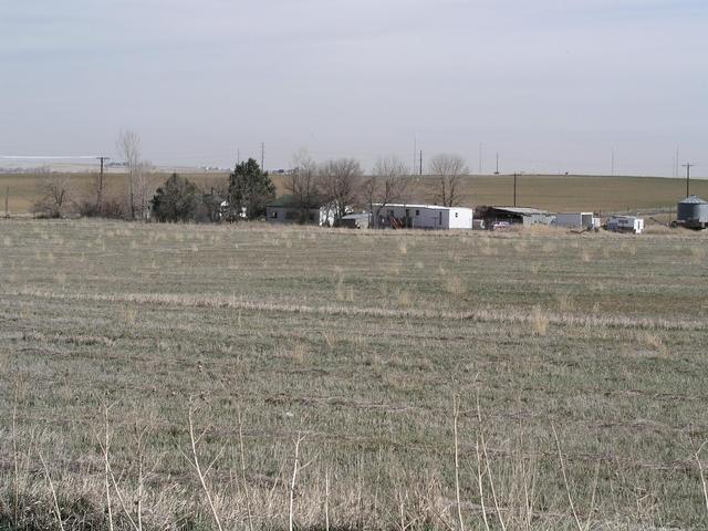 The farm buildings and open space to the southeast of 40N 105W will soon be a thing of the past.
