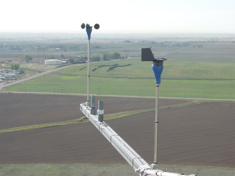 Cup anemometer and wind vane mounted on the BAO tower at 100 m above ground level.  The confluence point is just out there about three miles from the tower!