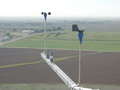 #6: Cup anemometer and wind vane mounted on the BAO tower at 100 m above ground level.  The confluence point is just out there about three miles from the tower!