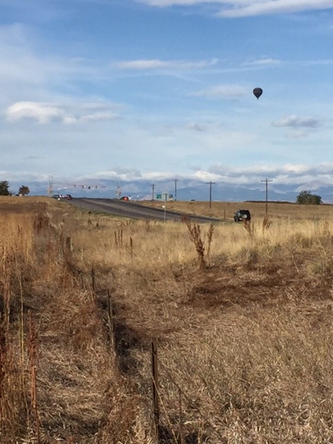 West, with a balloon in the air