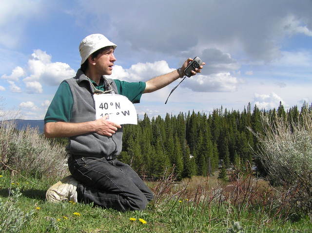 The confluence is that way!  Joseph Kerski pointing to 40 North 107 West.