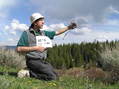 #2: The confluence is that way!  Joseph Kerski pointing to 40 North 107 West.