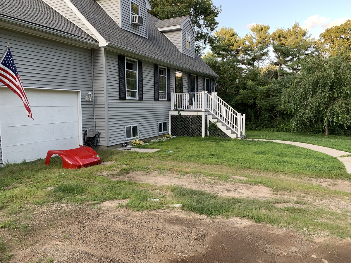 The confluence point in front of the garage