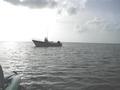 #4: West from the confluence, over the Gulf of Mexico (Joe's boat and  the stern of my kayak are visable)