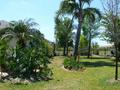 #4: Looking West from the CP towards the side of the house