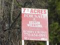 #6: Sign of the times:  For sale sign about 2 km northeast of the confluence.