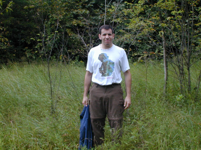 Tom stands on the confluence.