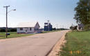 #7: The post office and grain elevator in the town of Gillett Grove