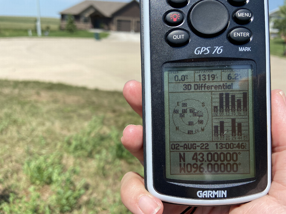 GPS receiver at the confluence point. 