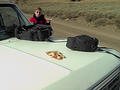 #7: Cold pizza warming on the hood of the truck.