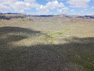 #11: View West, from 120m above the point