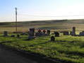 #4: The confluence is in the upper left in this view from the cemetery.