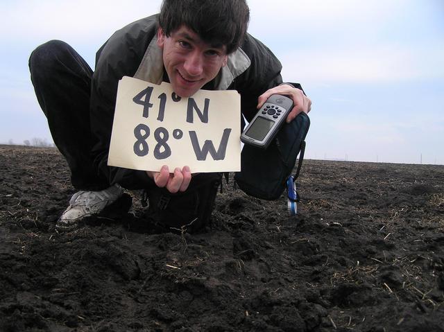 Joseph Kerski at a muddy 41 North 88 West, my 100th attempted confluence!