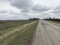 #8: Nearest road to the confluence, about 120 meters south, looking east. 