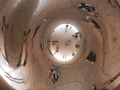 #10: The Confluence Hunters take a picture from below the “omphalos” in “the Bean.”