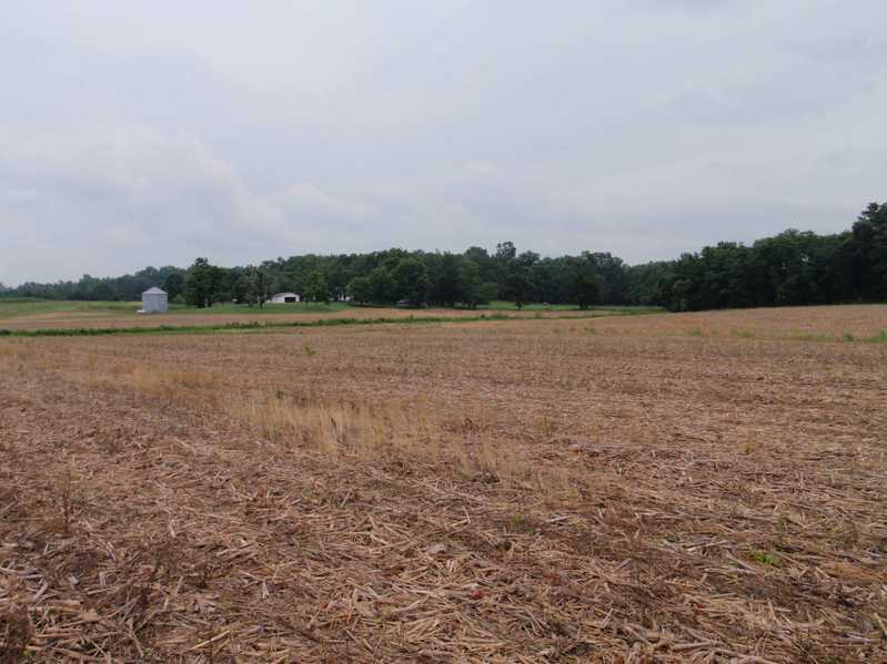 N38 W087 with farm in background