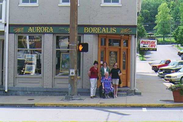 My sisters and Dorothy in front of the Aurora Borealis in Aurora, Indiana.