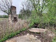 #8: Abandoned building 500 meters northeast of 37N 95W
