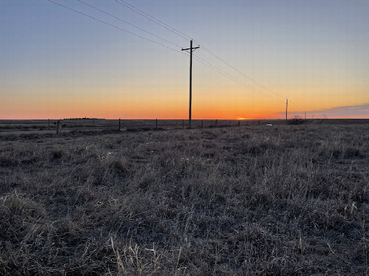 #1: View ENE toward the confluence in the foreground, rising sun in the background