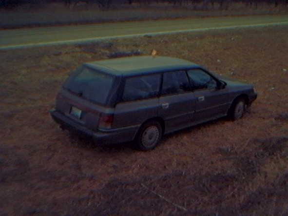 My car with orange sheriff sticker