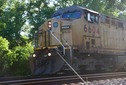 #7: A freight train passes along the railroad tracks, just north of the point