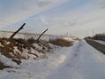 #9: Nearest road to the confluence, the one to the west, looking south.