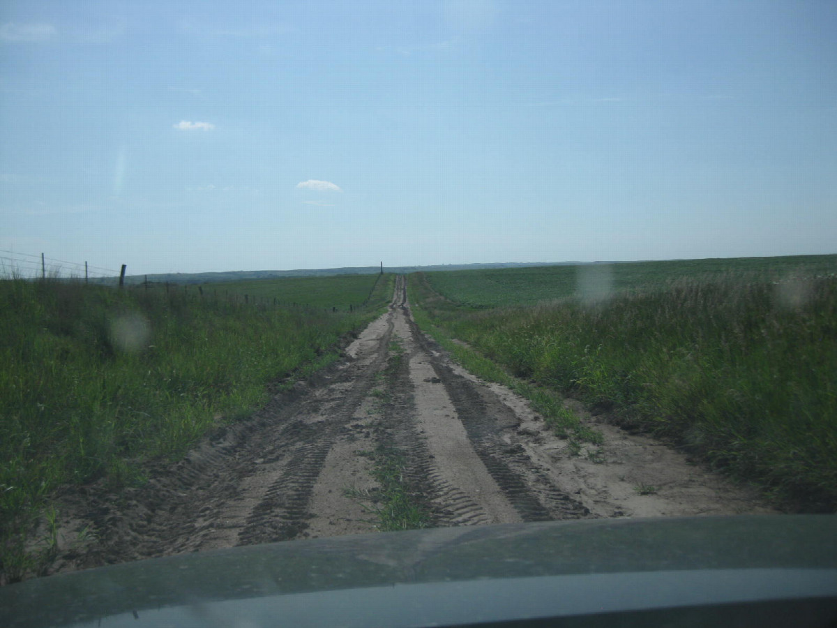 Driving the rough farm road in, Kansas on the left and Nebraska on the right